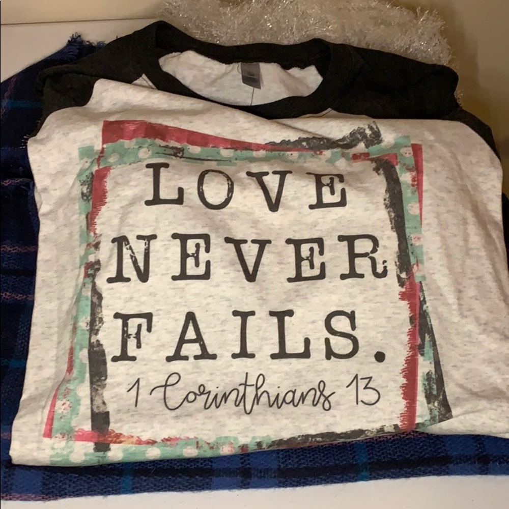 Love Never Fails 3/4 sleeve t-shirt